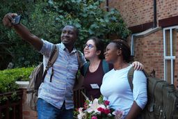 Three scholars taking selfie