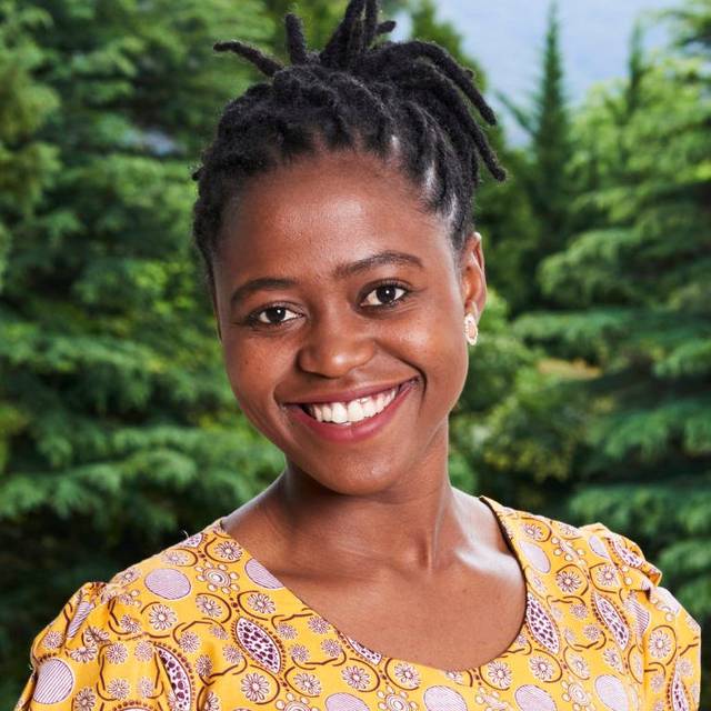 Crossing the finish line with Jill Samukimba