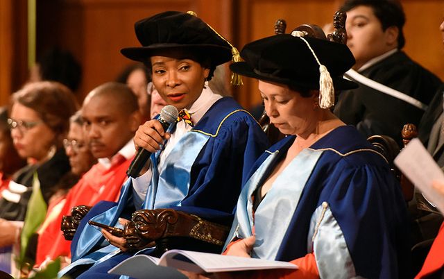 VC Prof Mamokgethi Phakeng addresses the graduation ceremony as DVC for Transformation Prof Loretta Feris (right) looks on.